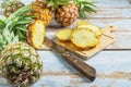 .Fresh pineapple fruit sliced Ã¢â¬â¹Ã¢â¬â¹on a wooden cutting board Royalty Free Stock Photo